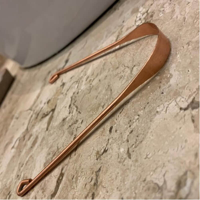 Raspador de Língua de cobre.